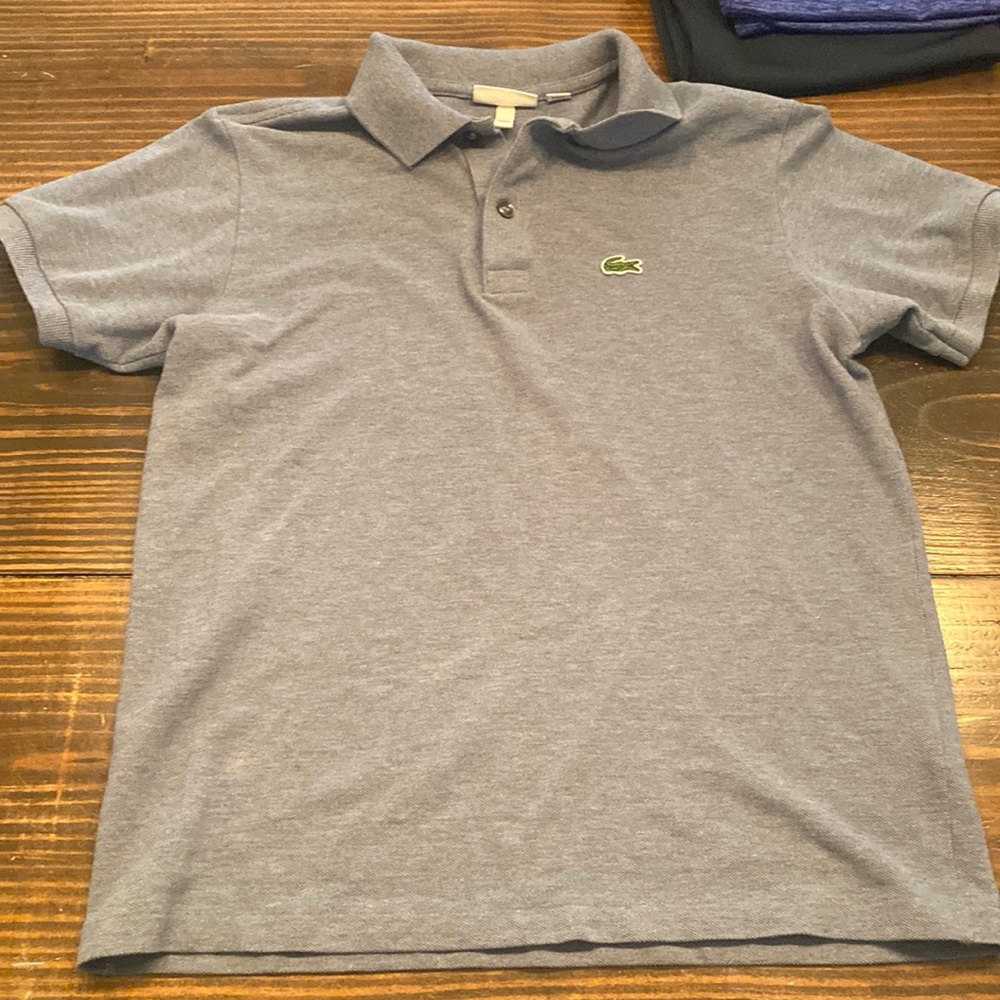 lacoste polo tag sz 14. Fits more like a 12. Blue/gray